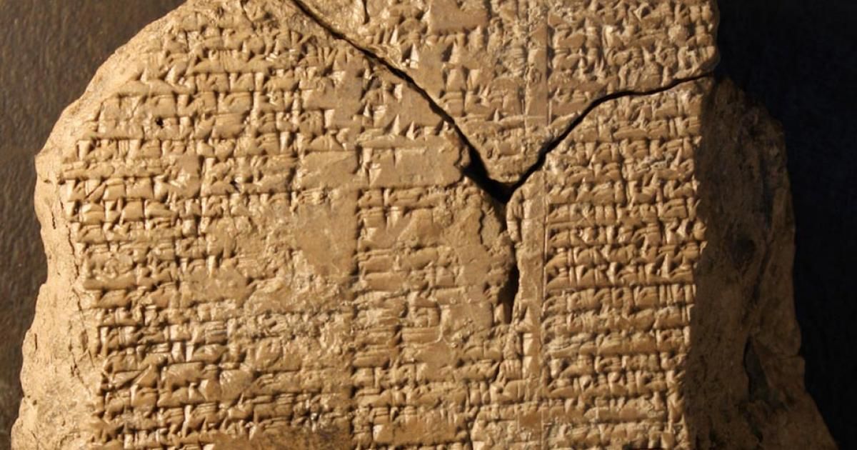 Ancient Mesopotamian clay tablet with cuneiform writing.