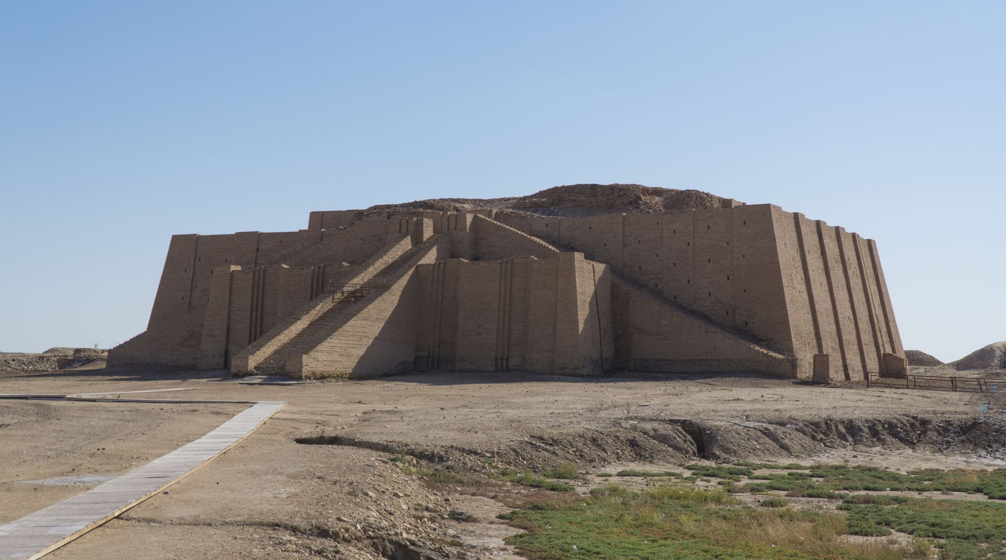 Mesopotamian stepped pyramid temple, ancient structure.