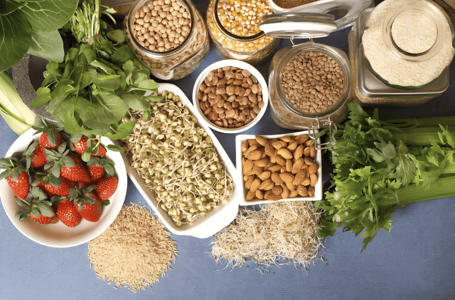 Assortment of fresh produce, grains, and nuts.