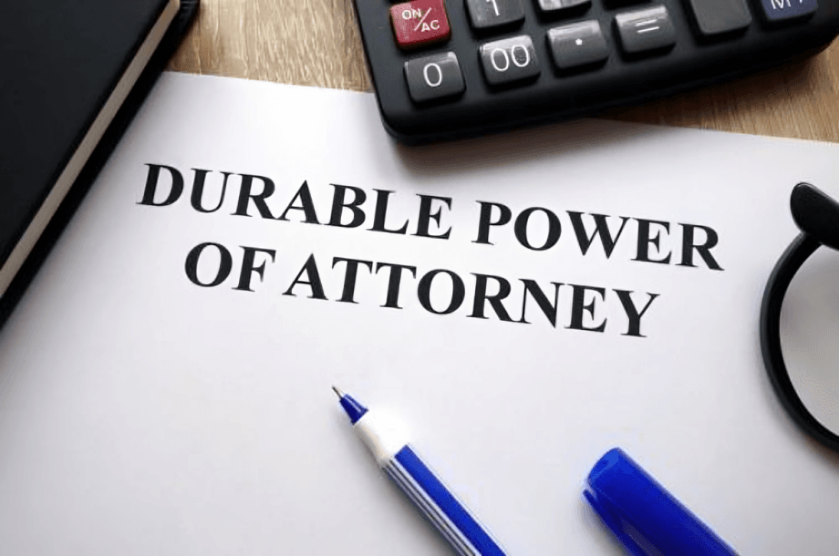 "Durable Power of Attorney" document, pen, calculator.