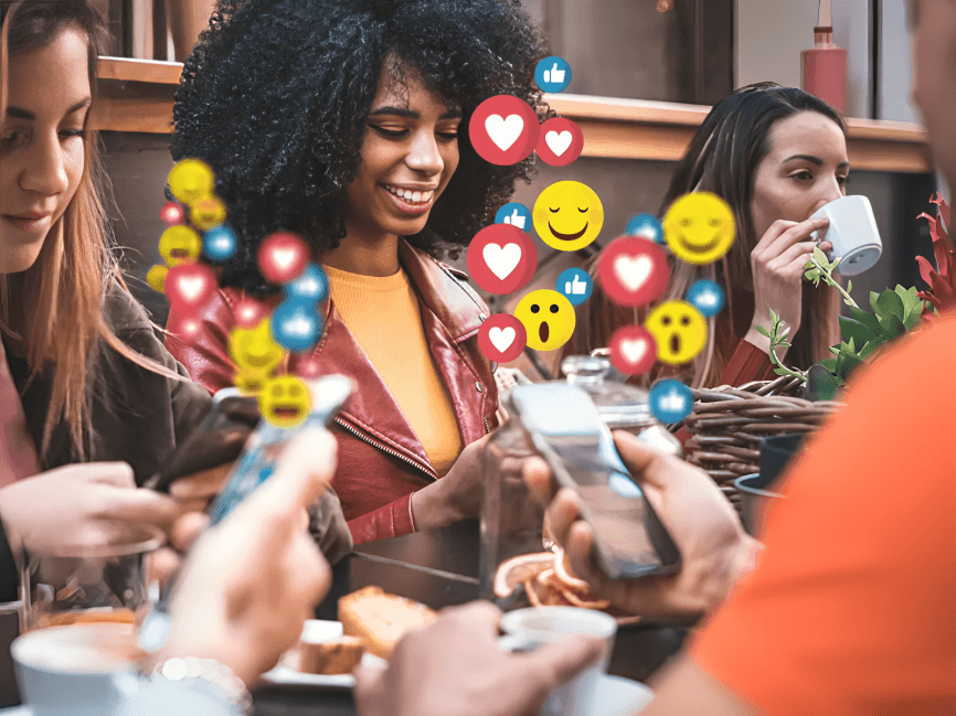 People gathered around phones, showing social media reactions.
