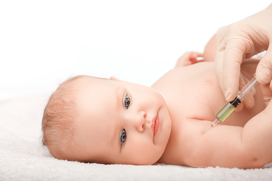 A baby receives a vaccine shot in the arm.