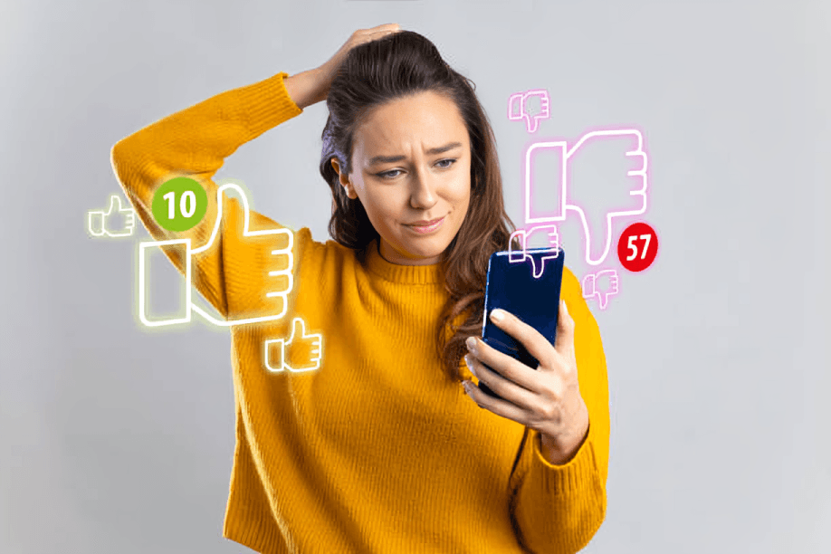 Woman confused by social media likes and dislikes on phone.