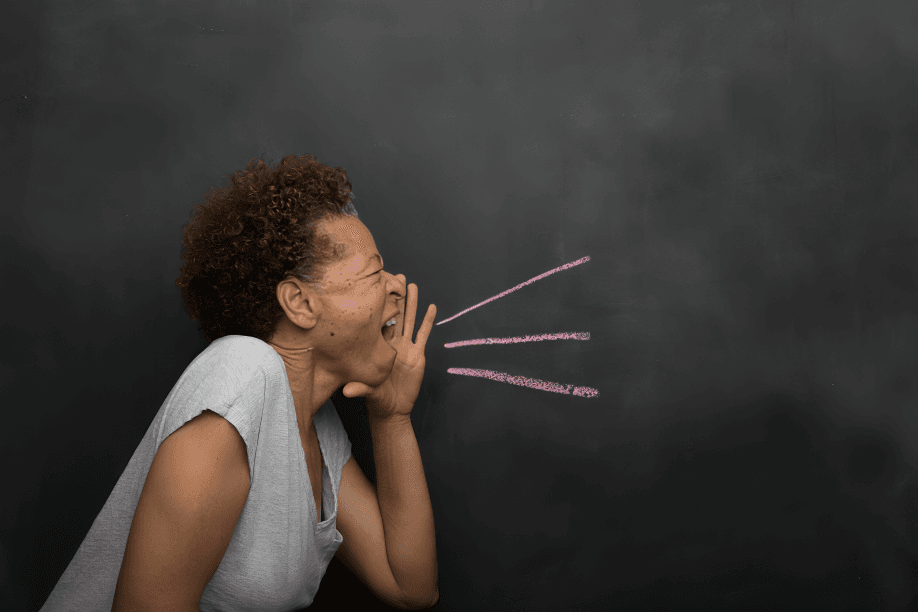 The woman appears to be yelling, with sound waves illustrated.