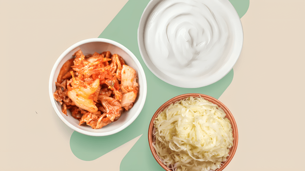 Three bowls: kimchi, plain yogurt, and sauerkraut.