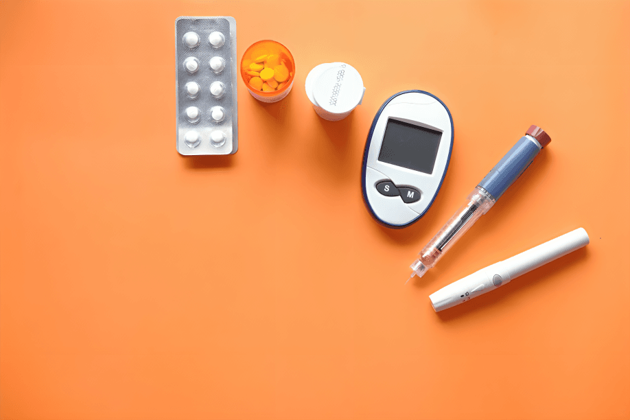 Diabetes management supplies: glucometer, insulin pen, and medication.
