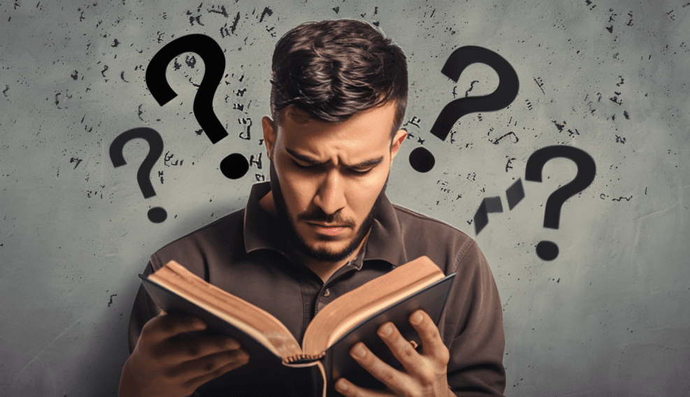 Man with beard reading a book, surrounded by question marks.